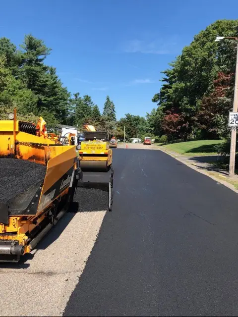 Paver and roller on a residential street